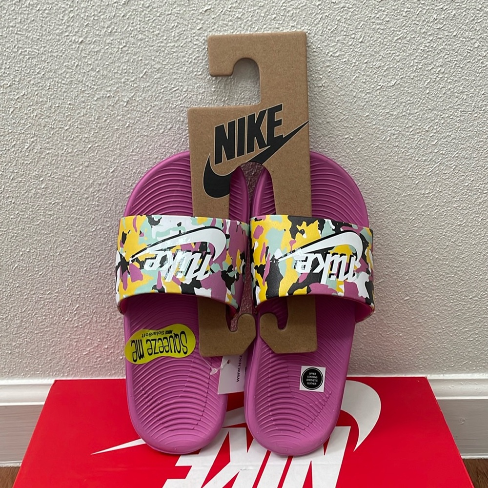 Girl Nike slides